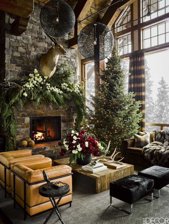 A Montana cabin's living room decorated for Christmas by Ken Fulk, Photographed by Douglas Friedman
